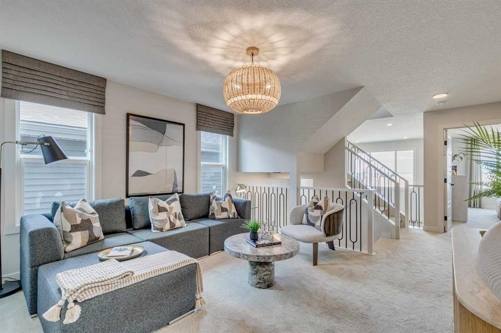 34 Amblefield Common Nw, Calgary, AB - Indoor Photo Showing Living Room