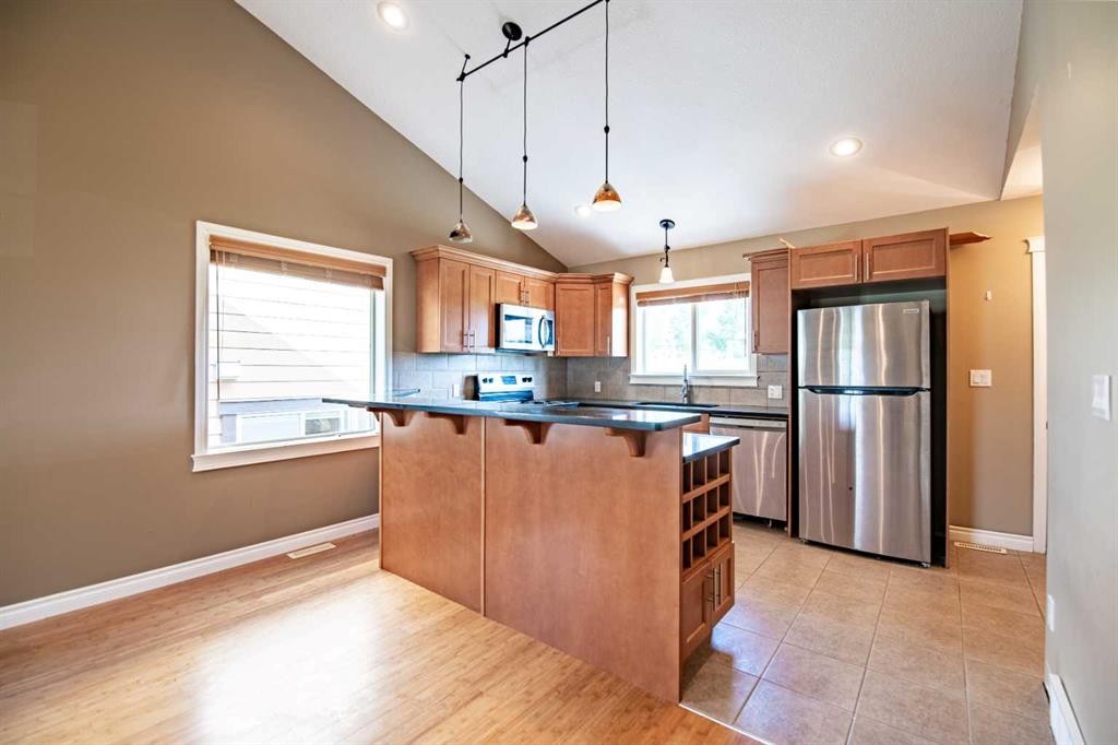 4024-25054 South Pine Lake Road, Rural Red Deer County, AB - Indoor Photo Showing Kitchen With Stainless Steel Kitchen