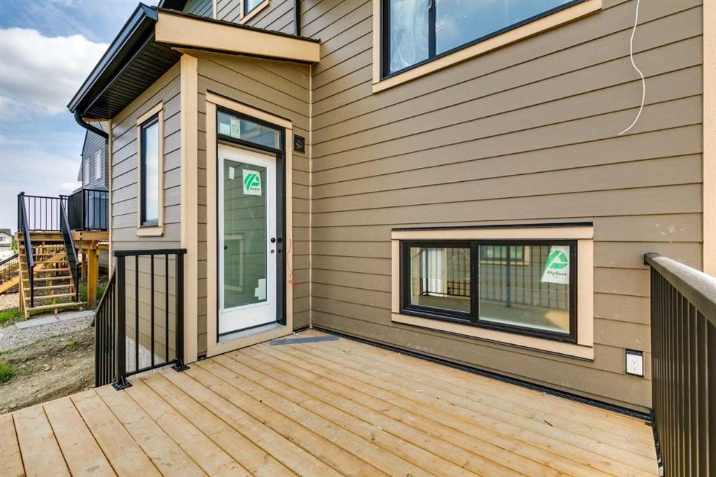 57 Bluerock Hill Sw, Calgary, AB - Outdoor With Deck Patio Veranda With Exterior