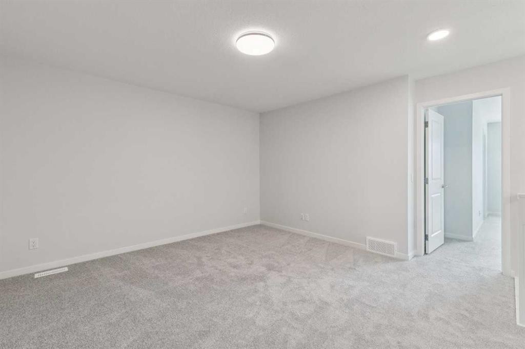 41 Belmont Row Sw, Calgary, AB - Indoor Photo Showing Other Room