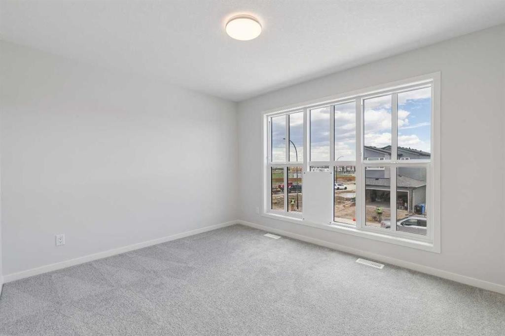 41 Belmont Row Sw, Calgary, AB - Indoor Photo Showing Other Room
