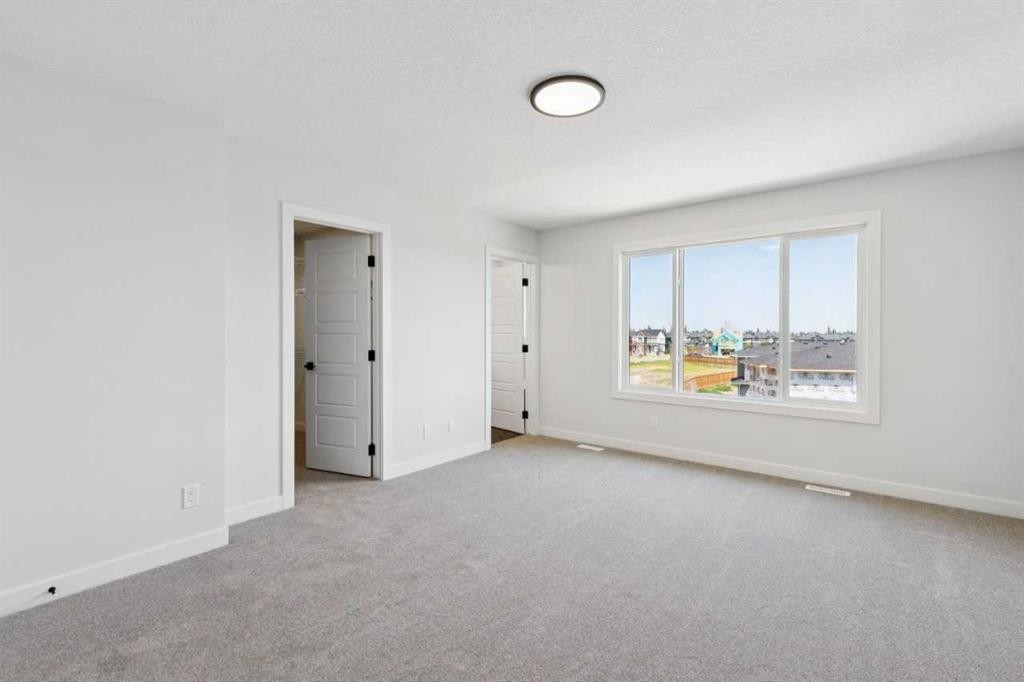 199 Bridgeport Circle, Chestermere, AB - Indoor Photo Showing Other Room