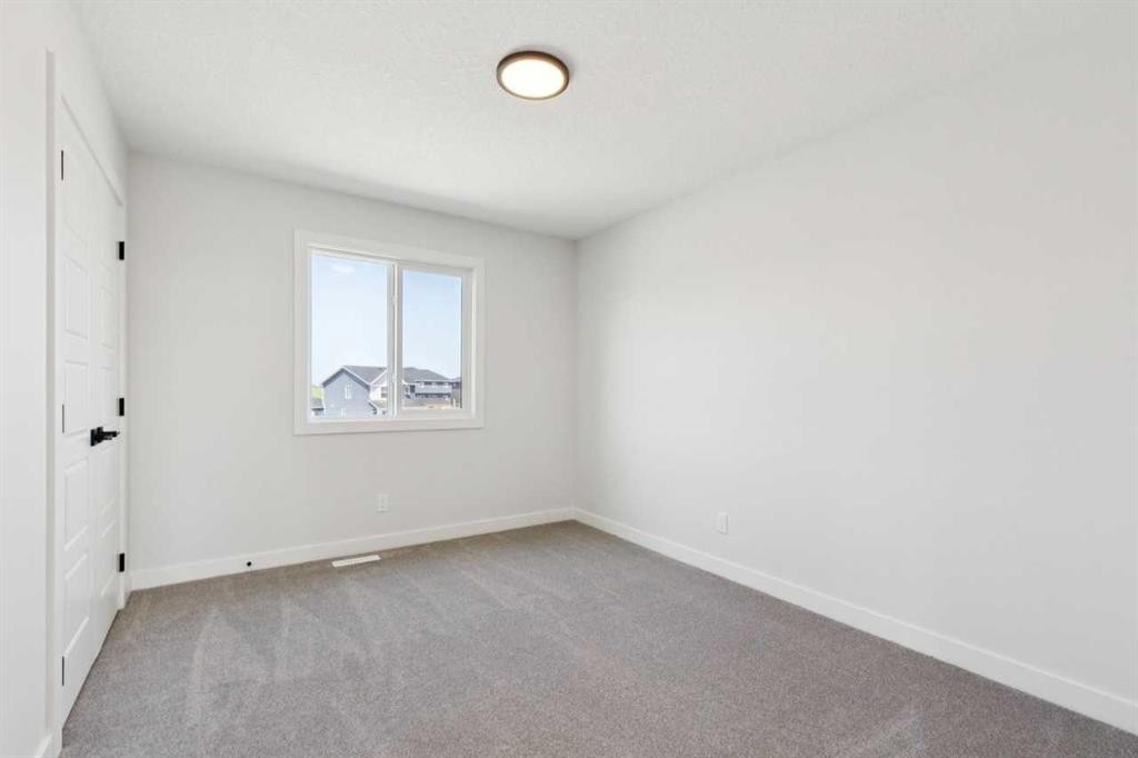 199 Bridgeport Circle, Chestermere, AB - Indoor Photo Showing Other Room