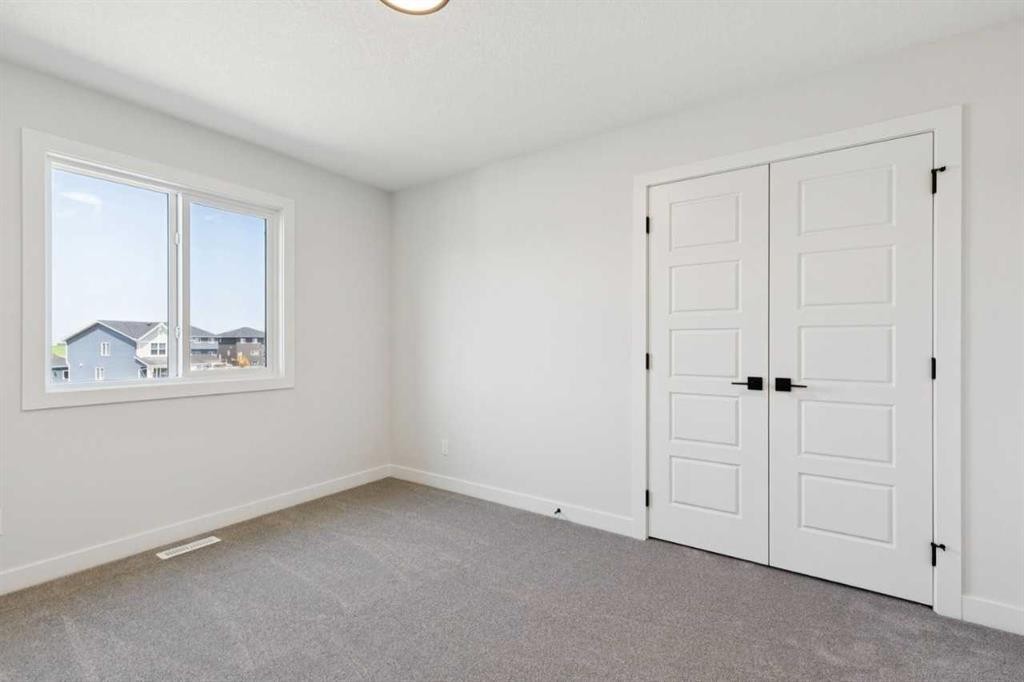 199 Bridgeport Circle, Chestermere, AB - Indoor Photo Showing Other Room