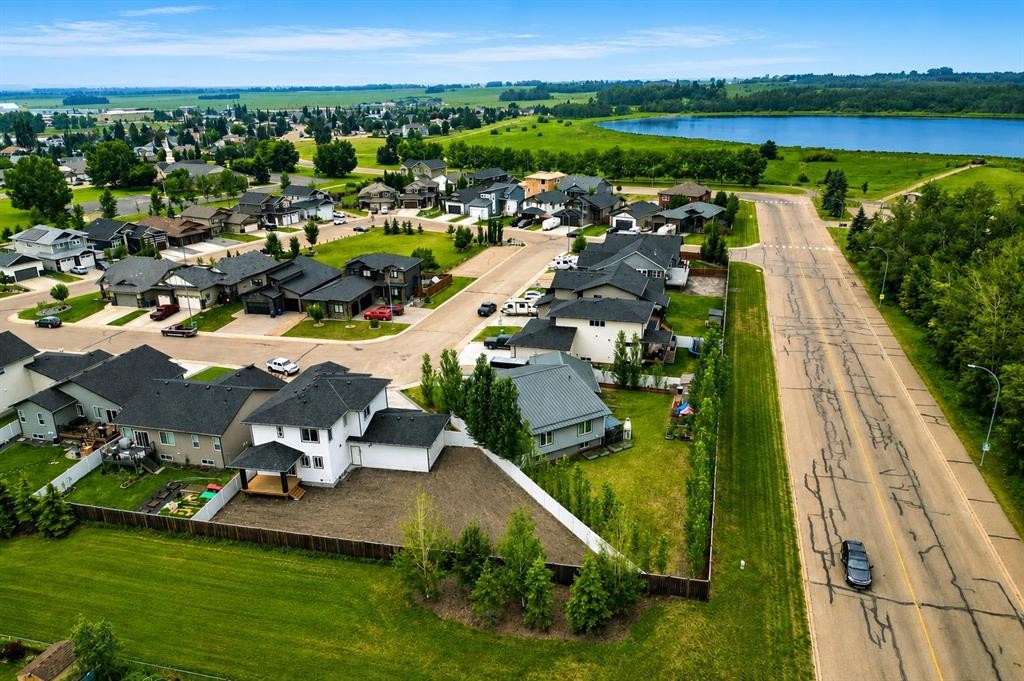 14 Napoleon Meadows Way, Innisfail, AB - Outdoor With Body Of Water With View