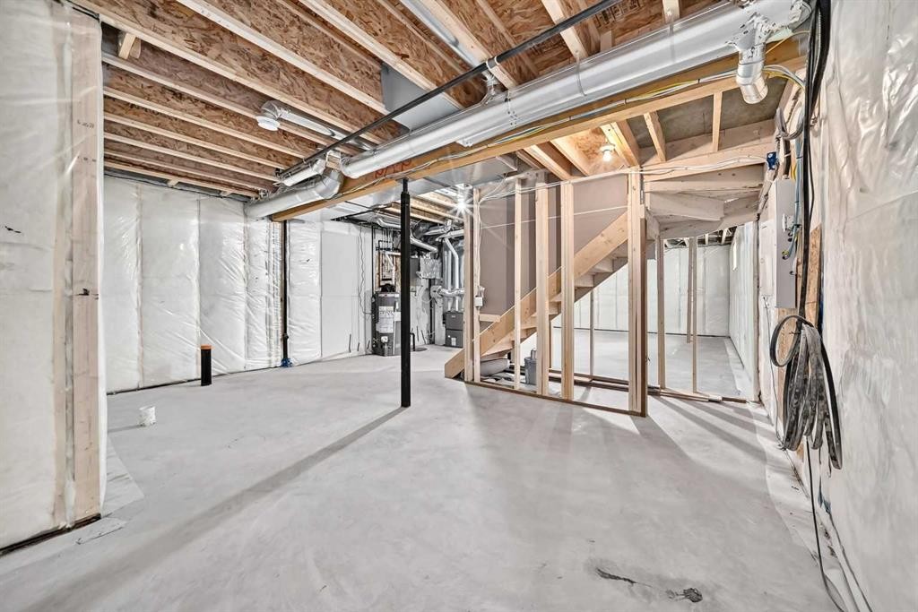 14 Napoleon Meadows Way, Innisfail, AB - Indoor Photo Showing Basement