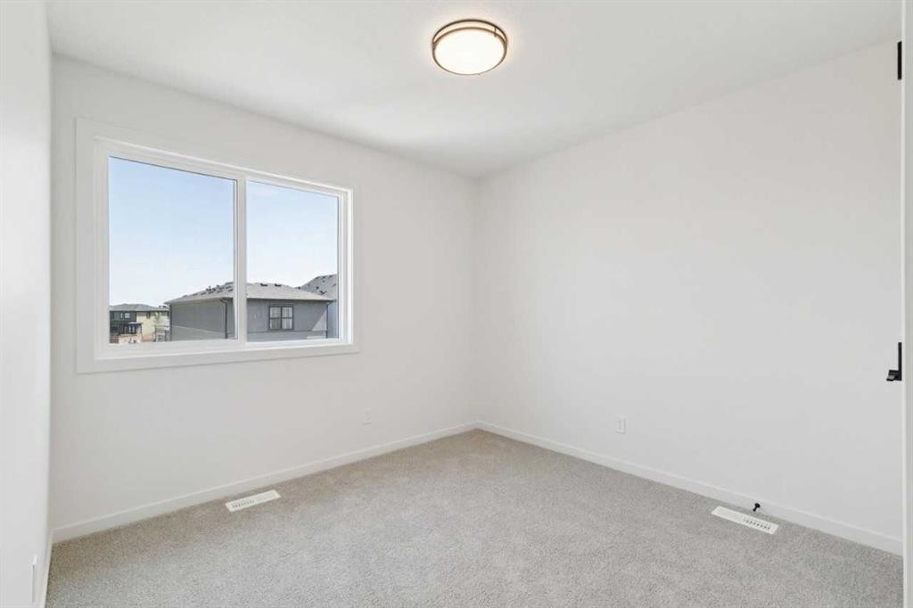 78 Alpine Common Sw, Calgary, AB - Indoor Photo Showing Other Room