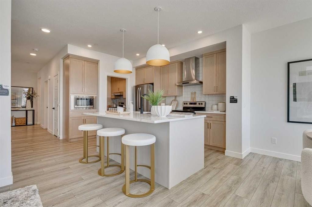 145 Snowberry Common Se, Calgary, AB - Indoor Photo Showing Kitchen With Stainless Steel Kitchen With Upgraded Kitchen
