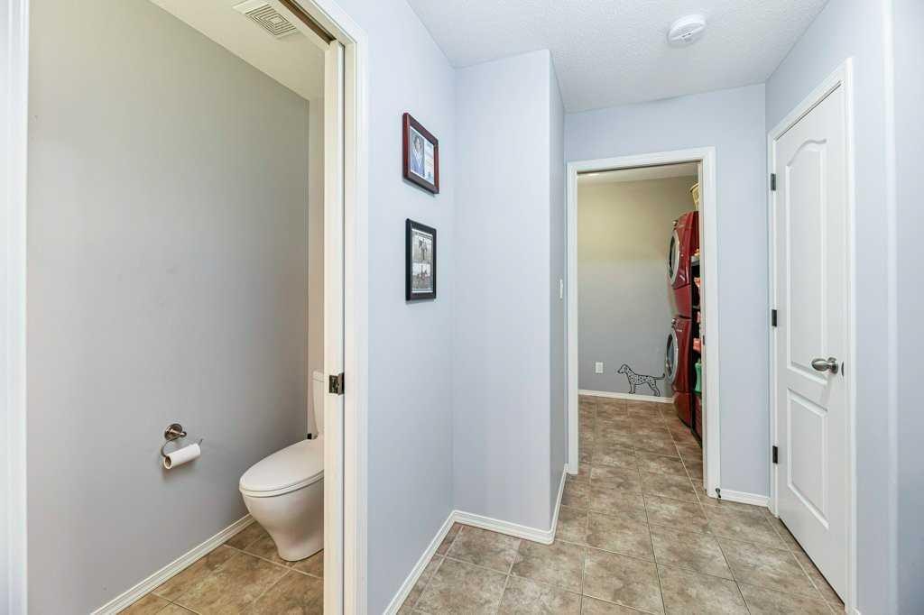 9 Henner'S Outlook, Lacombe, AB - Indoor Photo Showing Other Room
