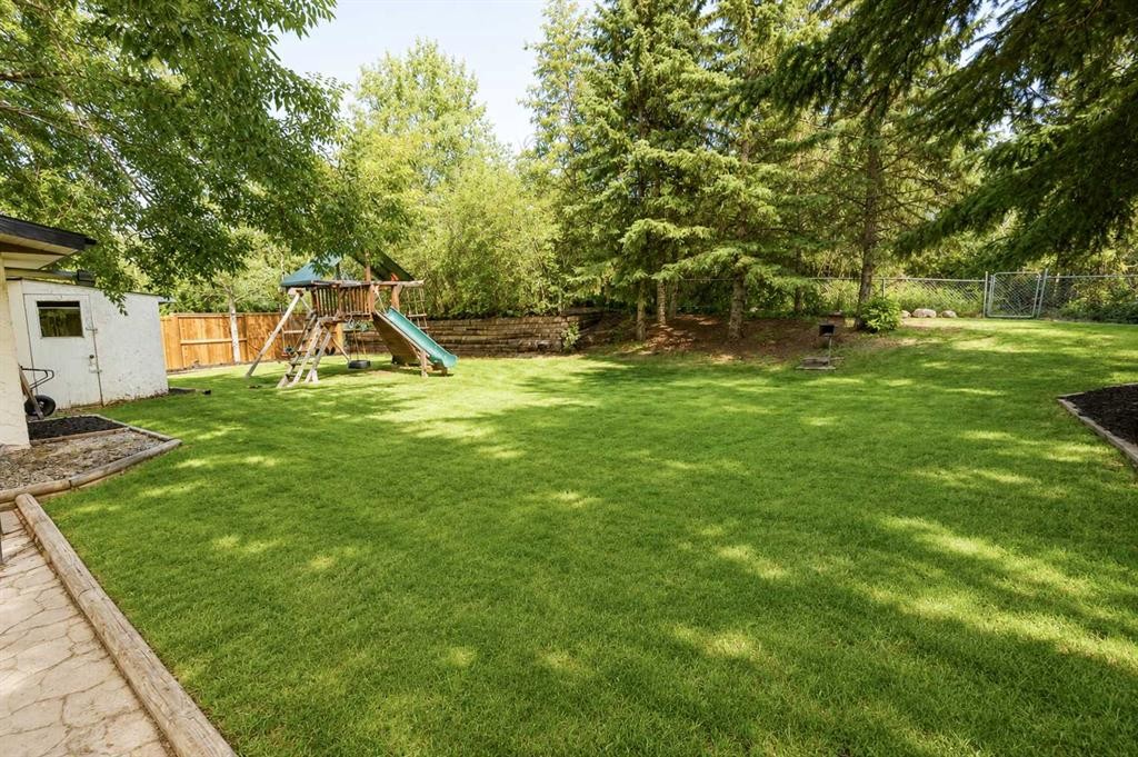 99 Piper Drive, Red Deer, AB - Outdoor With Backyard