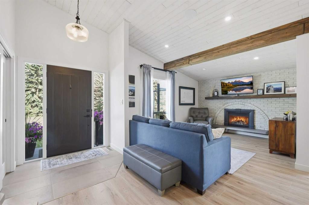 99 Piper Drive, Red Deer, AB - Indoor Photo Showing Living Room With Fireplace