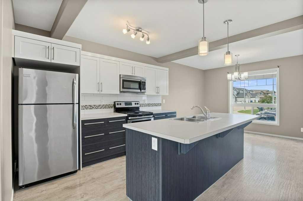 5 Crimson Court, Blackfalds, AB - Indoor Photo Showing Kitchen With Double Sink With Upgraded Kitchen