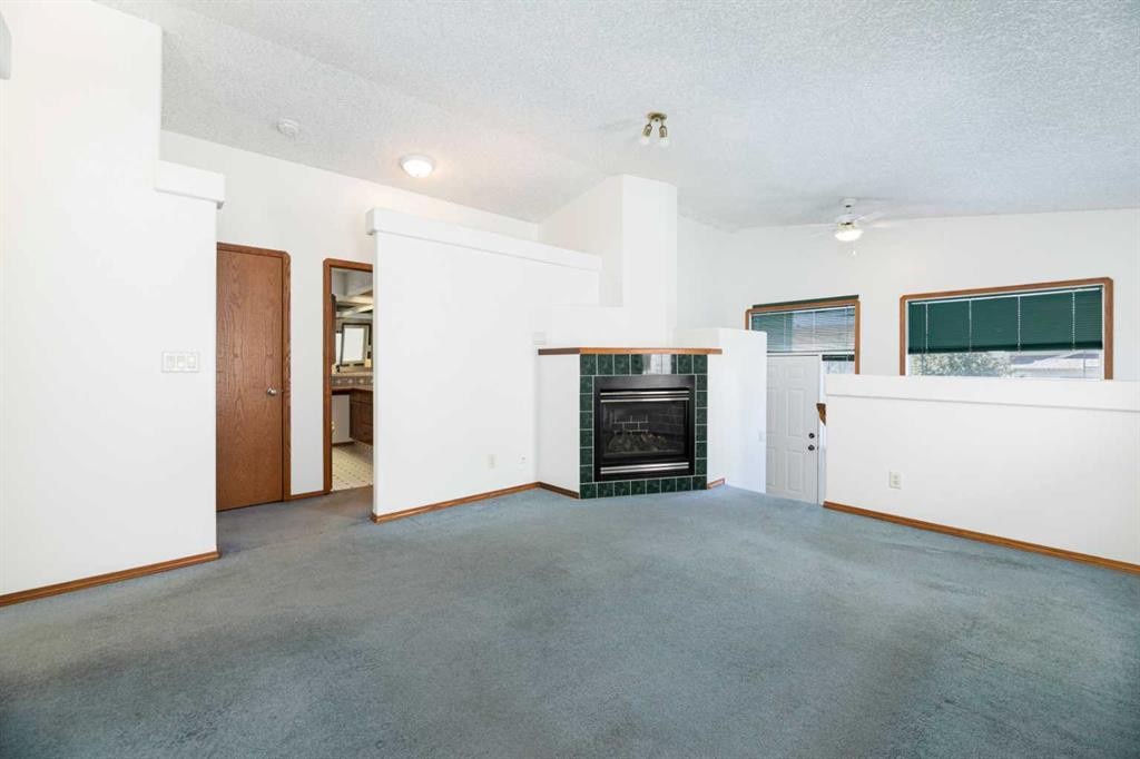 13 Duval Crescent, Red Deer, AB - Indoor With Fireplace