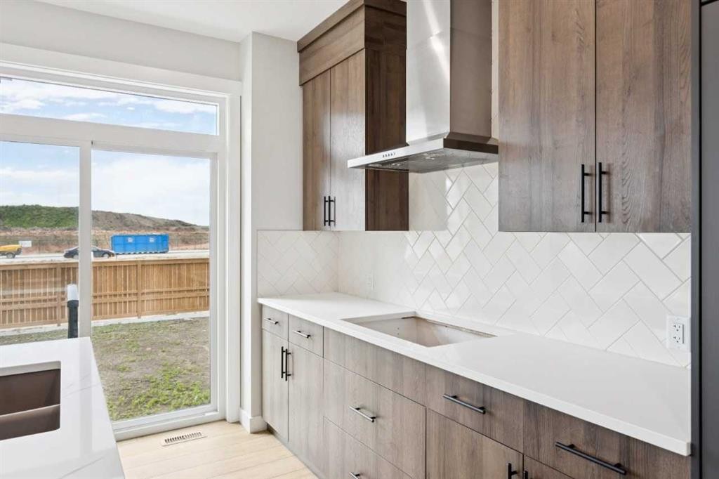102 Bridgeport Landing, Chestermere, AB - Indoor Photo Showing Kitchen