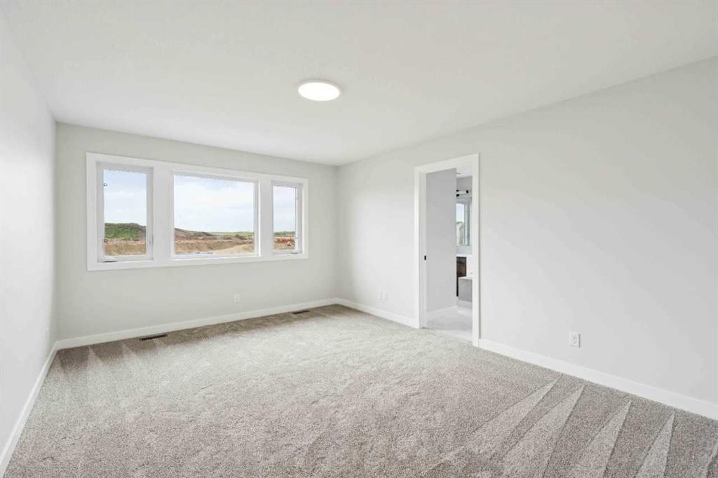 102 Bridgeport Landing, Chestermere, AB - Indoor Photo Showing Other Room