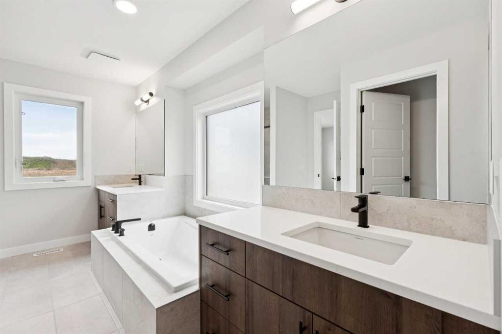 102 Bridgeport Landing, Chestermere, AB - Indoor Photo Showing Bathroom