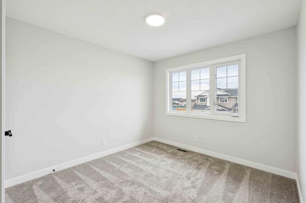 102 Bridgeport Landing, Chestermere, AB - Indoor Photo Showing Other Room