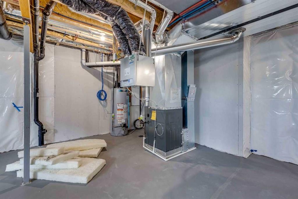102 Bridgeport Landing, Chestermere, AB - Indoor Photo Showing Basement