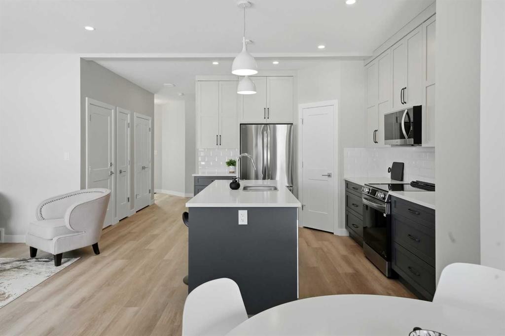 114 Palmer Circle, Blackfalds, AB - Indoor Photo Showing Kitchen With Upgraded Kitchen