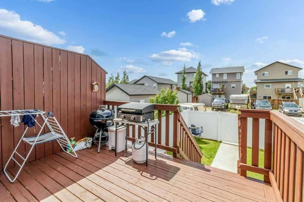 125 Henderson Crescent, Penhold, AB - Outdoor With Deck Patio Veranda With Exterior