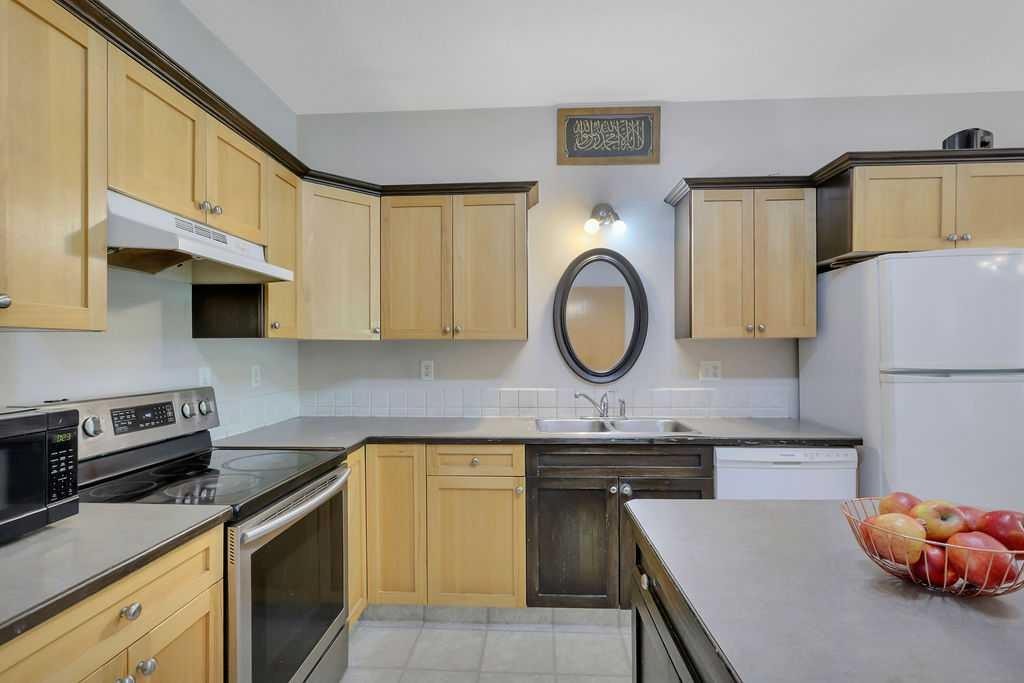 49 Abel Close, Red Deer, AB - Indoor Photo Showing Kitchen With Double Sink