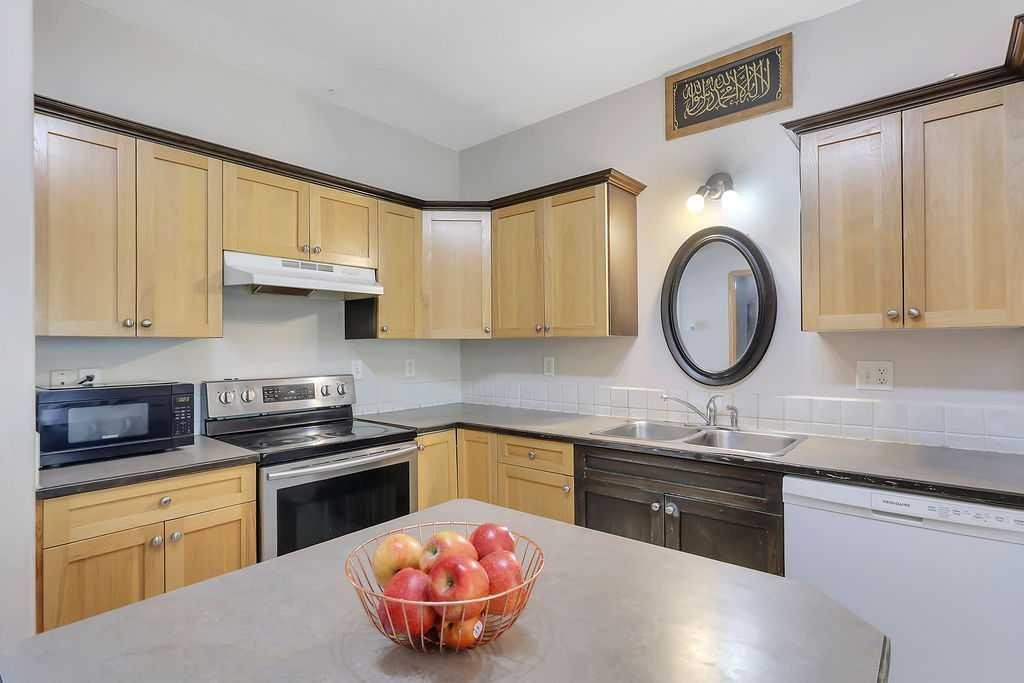 49 Abel Close, Red Deer, AB - Indoor Photo Showing Kitchen With Double Sink