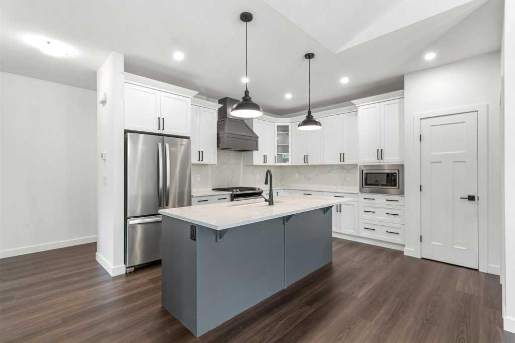 3902 46 Street, Red Deer, AB - Indoor Photo Showing Kitchen With Double Sink With Upgraded Kitchen