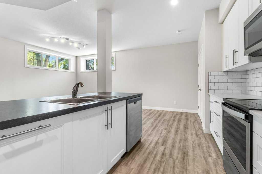 3902 46 Street, Red Deer, AB - Indoor Photo Showing Kitchen With Double Sink