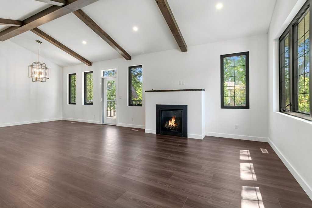 3902 46 Street, Red Deer, AB - Indoor Photo Showing Living Room With Fireplace