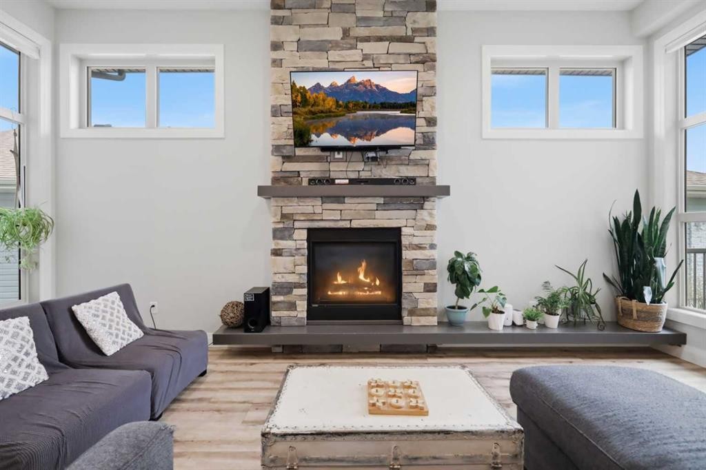 1 Meadow Close, Lacombe, AB - Indoor Photo Showing Living Room With Fireplace