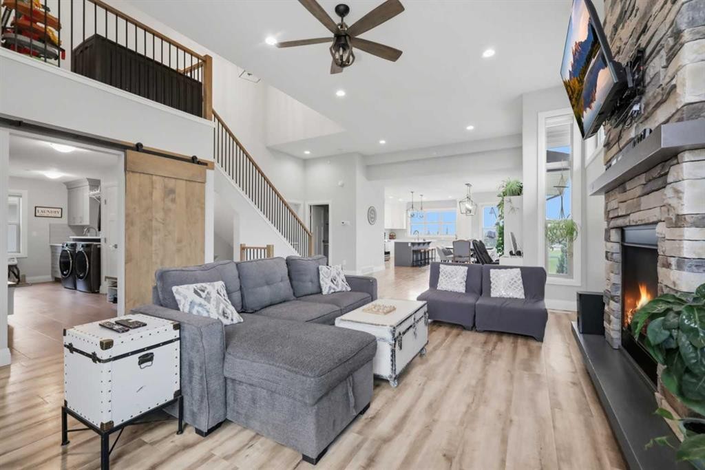 1 Meadow Close, Lacombe, AB - Indoor Photo Showing Living Room With Fireplace