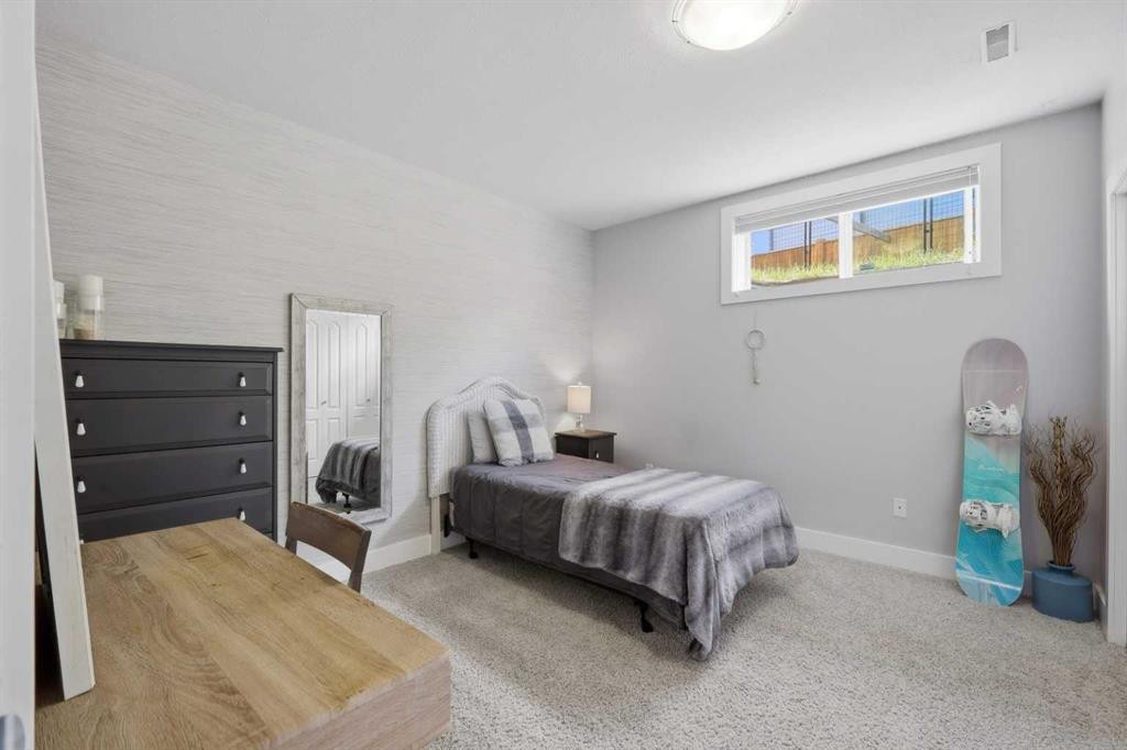 13 Hendrickson Bay, Sylvan Lake, AB - Indoor Photo Showing Bedroom