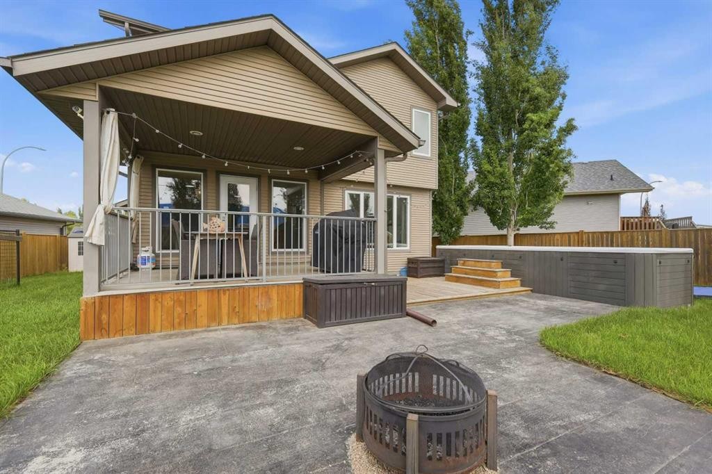 13 Hendrickson Bay, Sylvan Lake, AB - Outdoor With Deck Patio Veranda