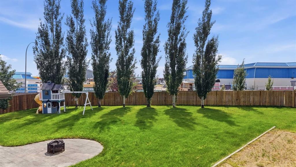 13 Hendrickson Bay, Sylvan Lake, AB - Outdoor With Backyard