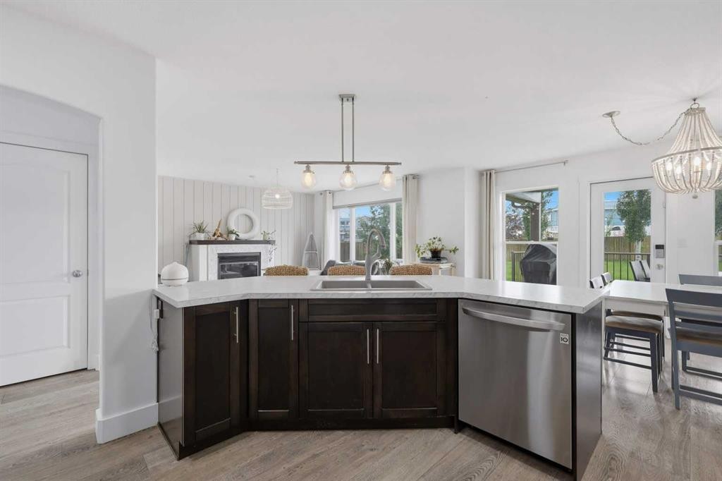 13 Hendrickson Bay, Sylvan Lake, AB - Indoor Photo Showing Kitchen With Double Sink