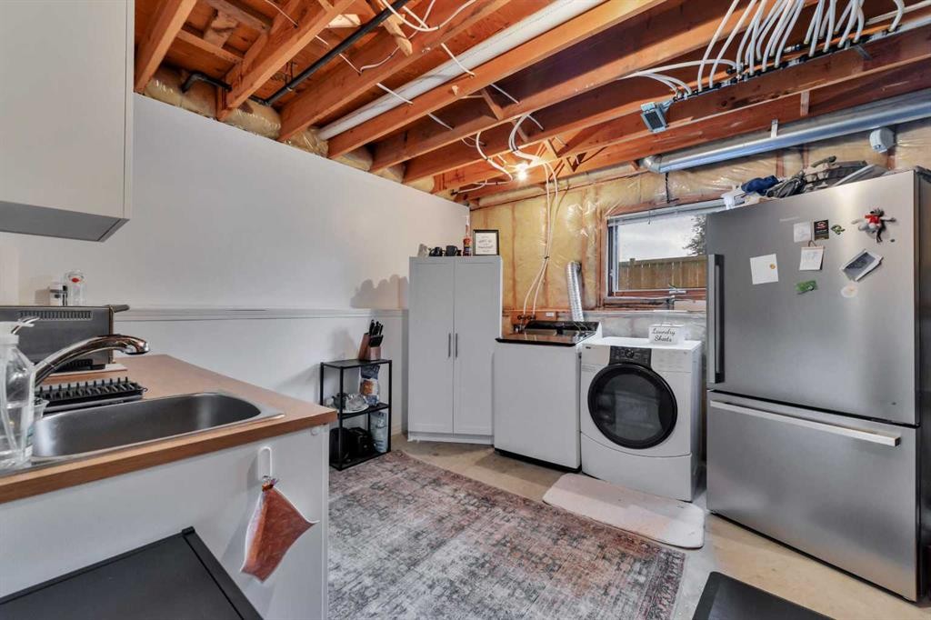 14 Eakins Crescent, Red Deer, AB - Indoor Photo Showing Laundry Room
