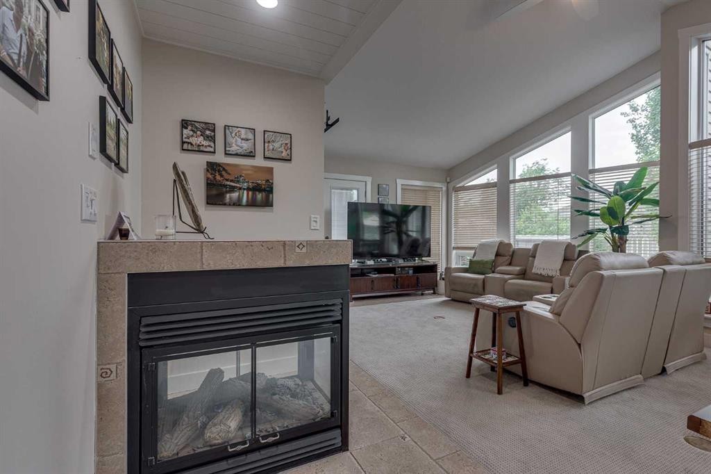 111 Selkirk Boulevard, Red Deer, AB - Indoor Photo Showing Living Room With Fireplace