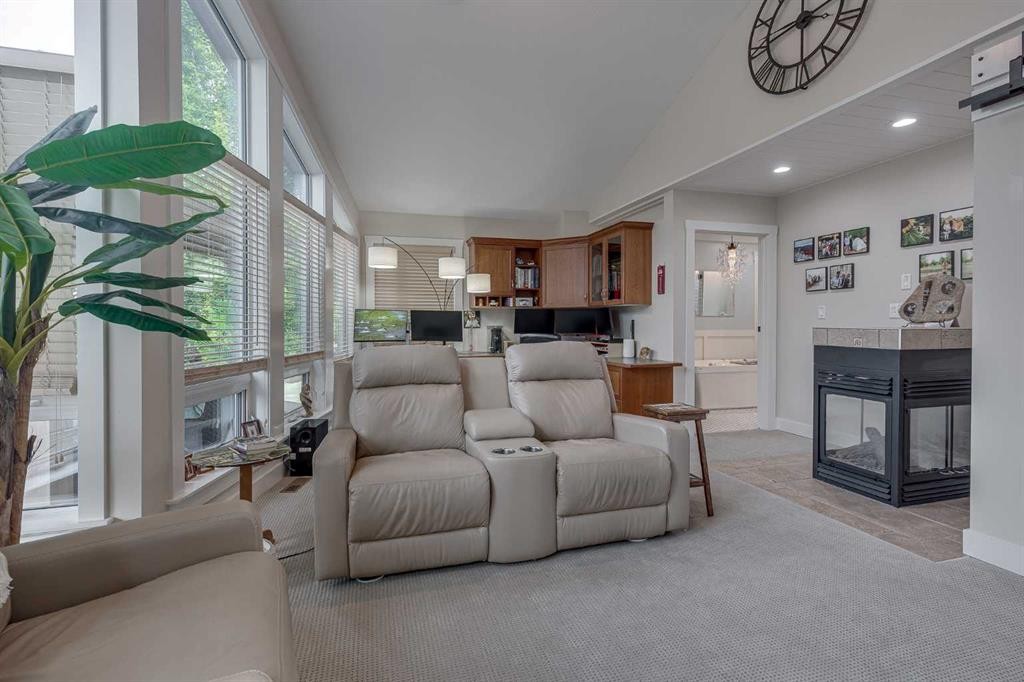 111 Selkirk Boulevard, Red Deer, AB - Indoor Photo Showing Living Room With Fireplace