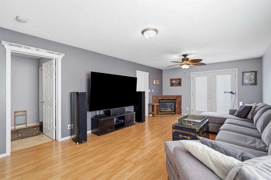 19 Ralston Crescent, Red Deer, AB - Indoor Photo Showing Living Room With Fireplace