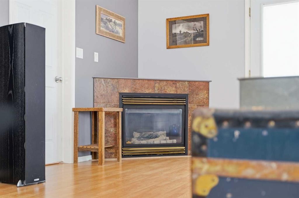 19 Ralston Crescent, Red Deer, AB - Indoor Photo Showing Living Room With Fireplace