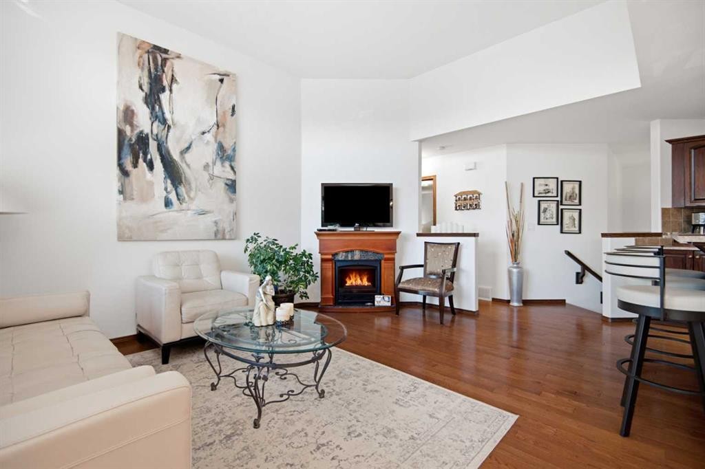 39 Landry Bend, Red Deer, AB - Indoor Photo Showing Living Room With Fireplace