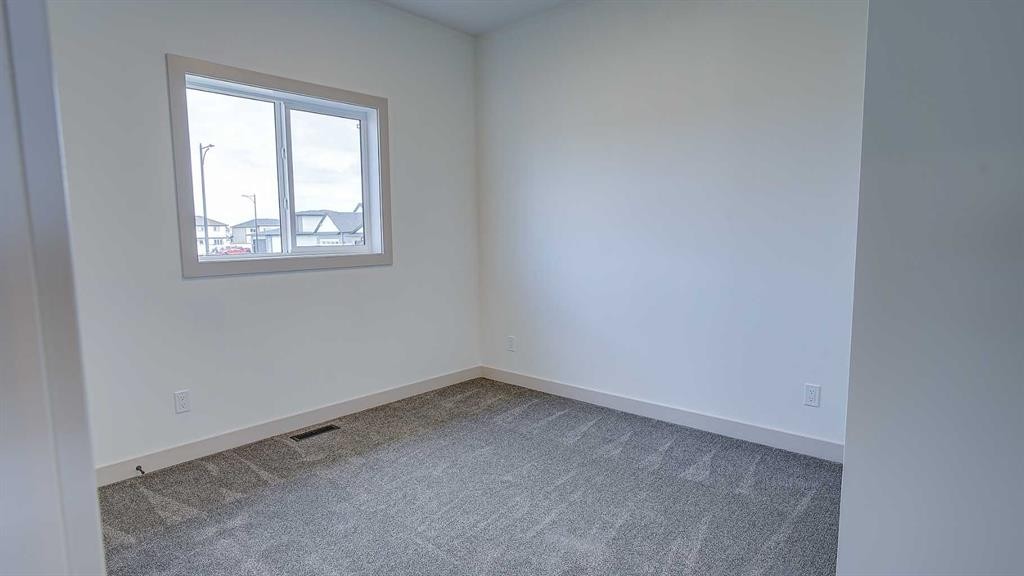 19 Ian Way, Sylvan Lake, AB - Indoor Photo Showing Other Room