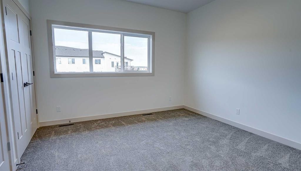 19 Ian Way, Sylvan Lake, AB - Indoor Photo Showing Other Room