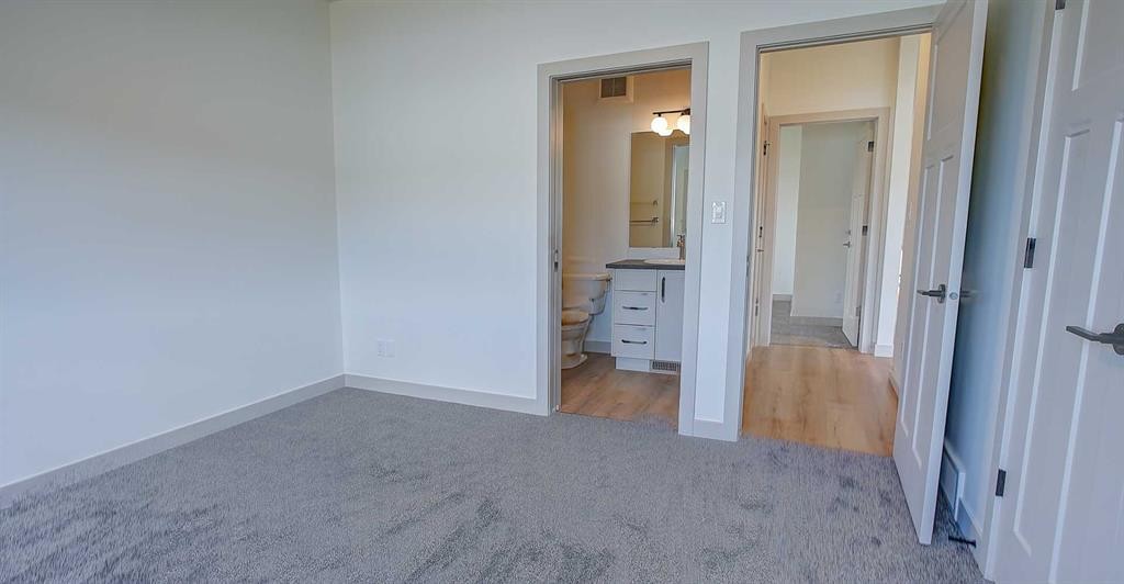 19 Ian Way, Sylvan Lake, AB - Indoor Photo Showing Other Room
