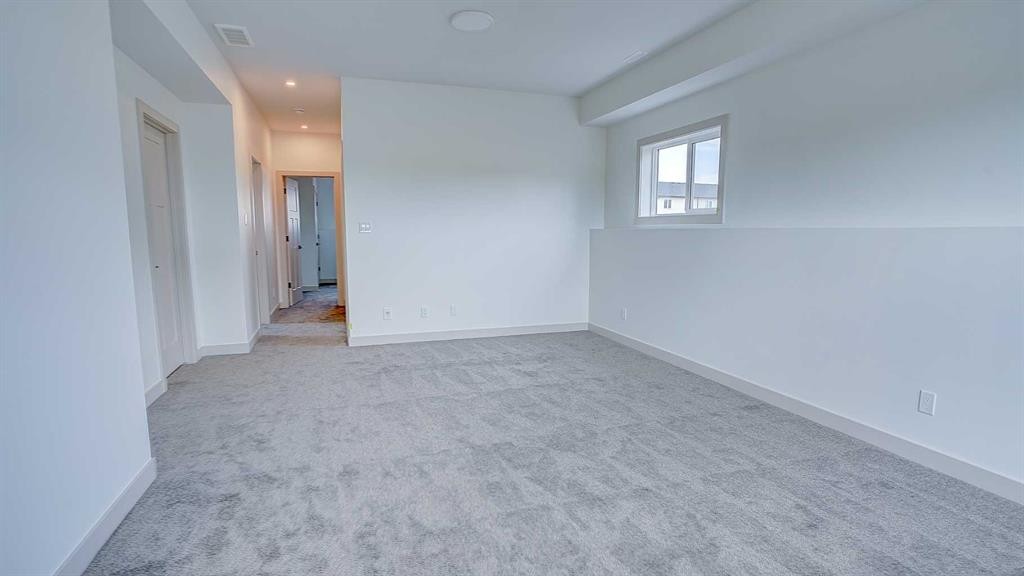 19 Ian Way, Sylvan Lake, AB - Indoor Photo Showing Other Room
