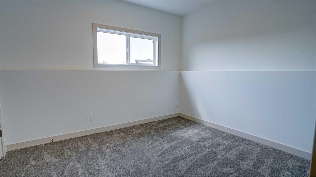 19 Ian Way, Sylvan Lake, AB - Indoor Photo Showing Other Room