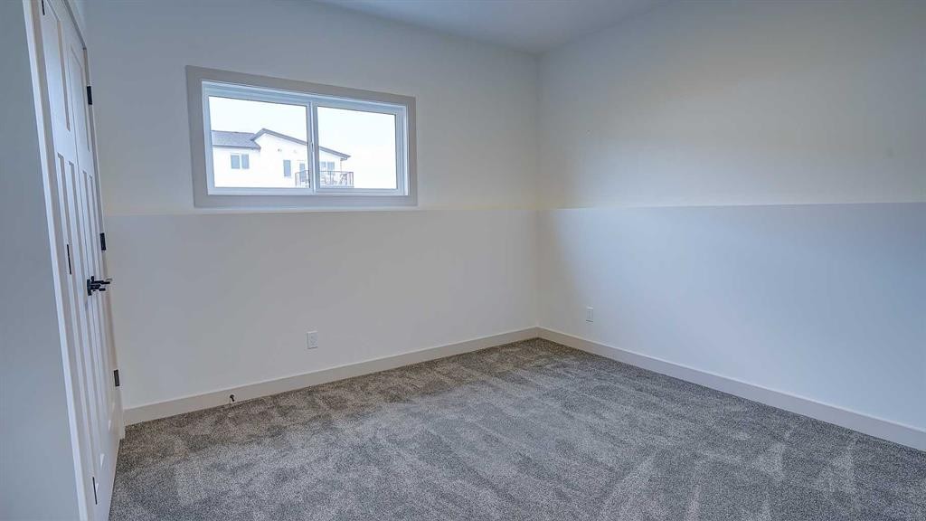 19 Ian Way, Sylvan Lake, AB - Indoor Photo Showing Other Room