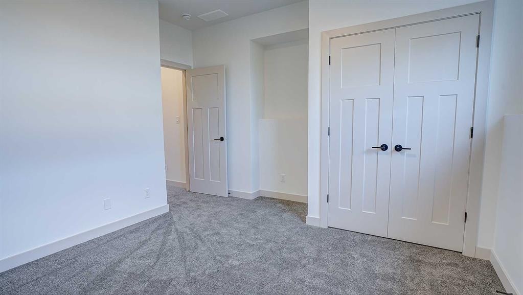 19 Ian Way, Sylvan Lake, AB - Indoor Photo Showing Other Room