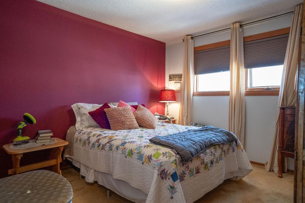 4908 47 Street, Clive, AB - Indoor Photo Showing Bedroom
