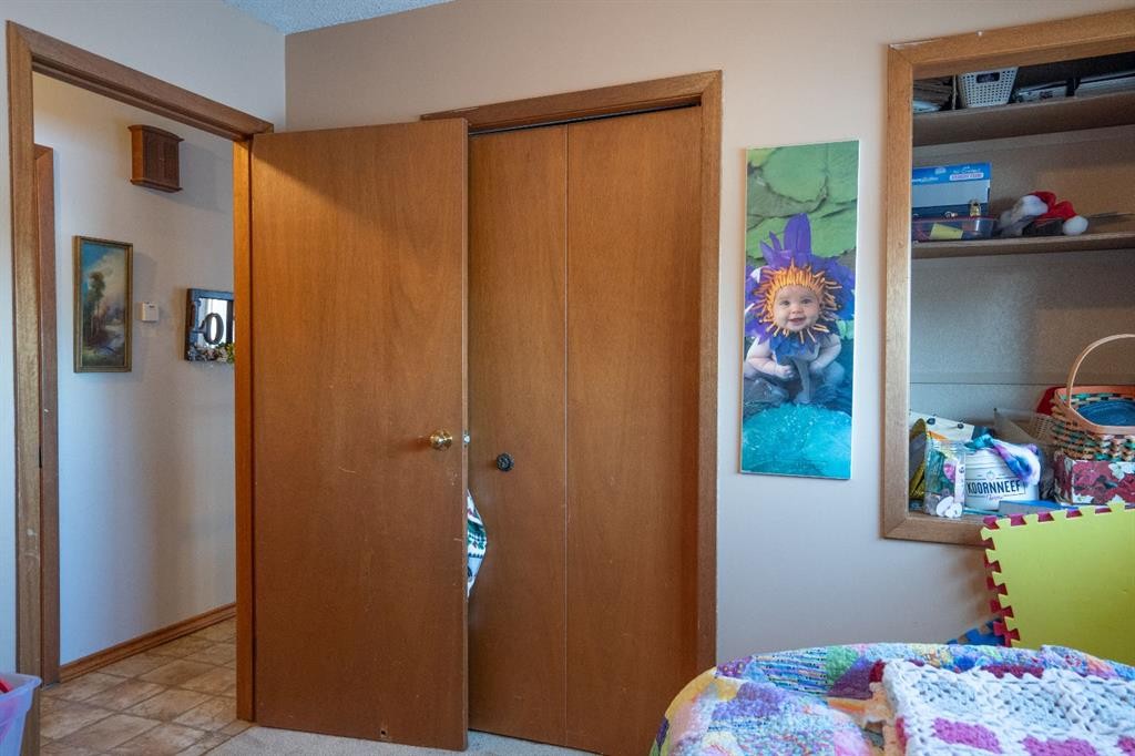 4908 47 Street, Clive, AB - Indoor Photo Showing Bedroom